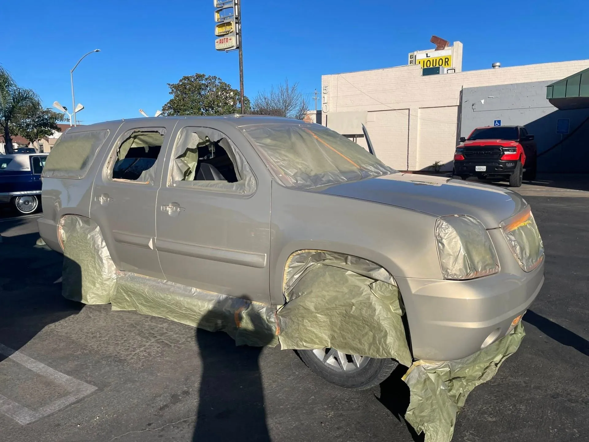 Auto body technician working in shop